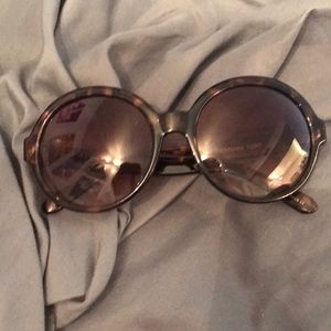 Brown and gold sunglasses